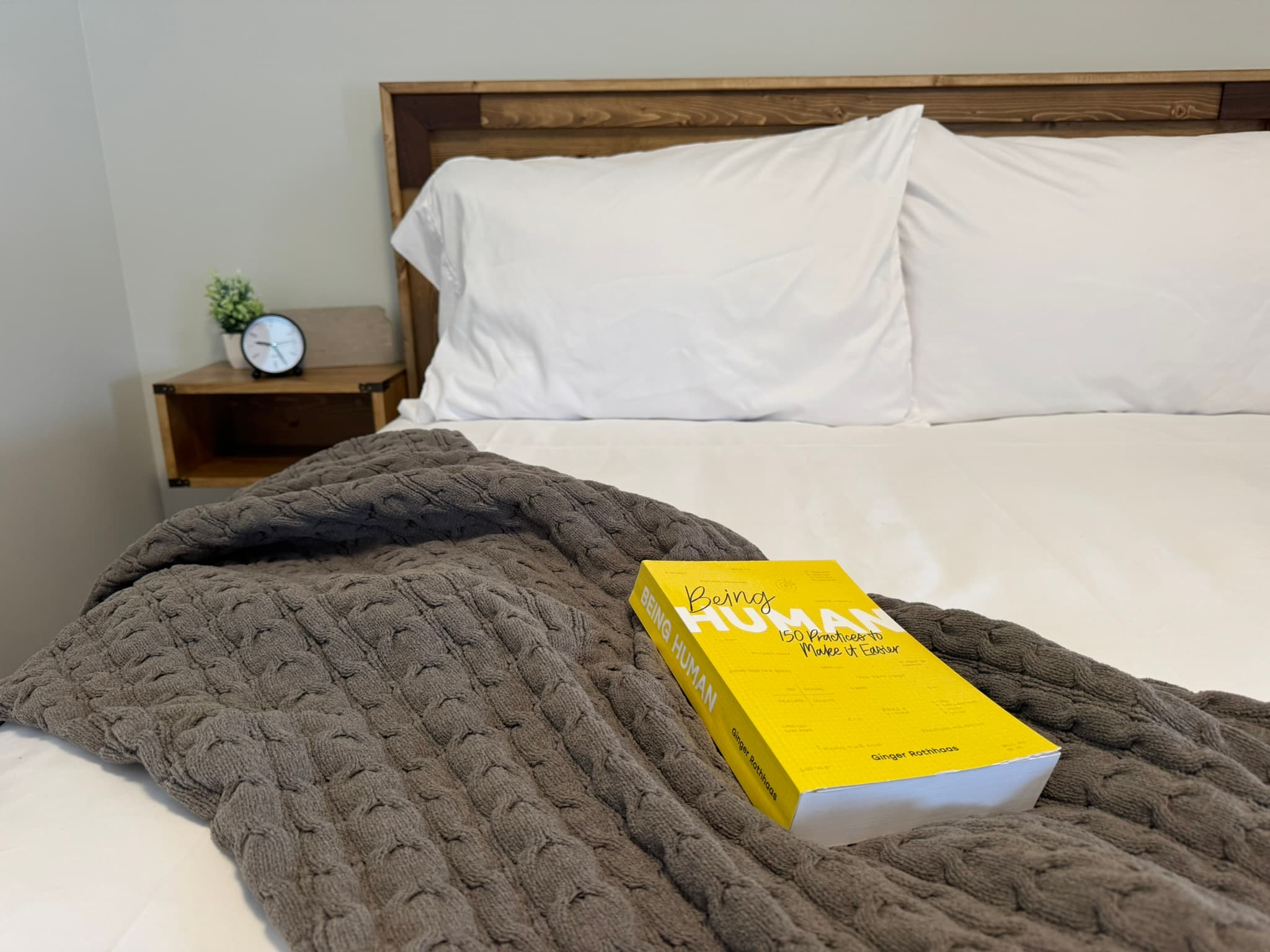 Image of queen bed in standard size room
